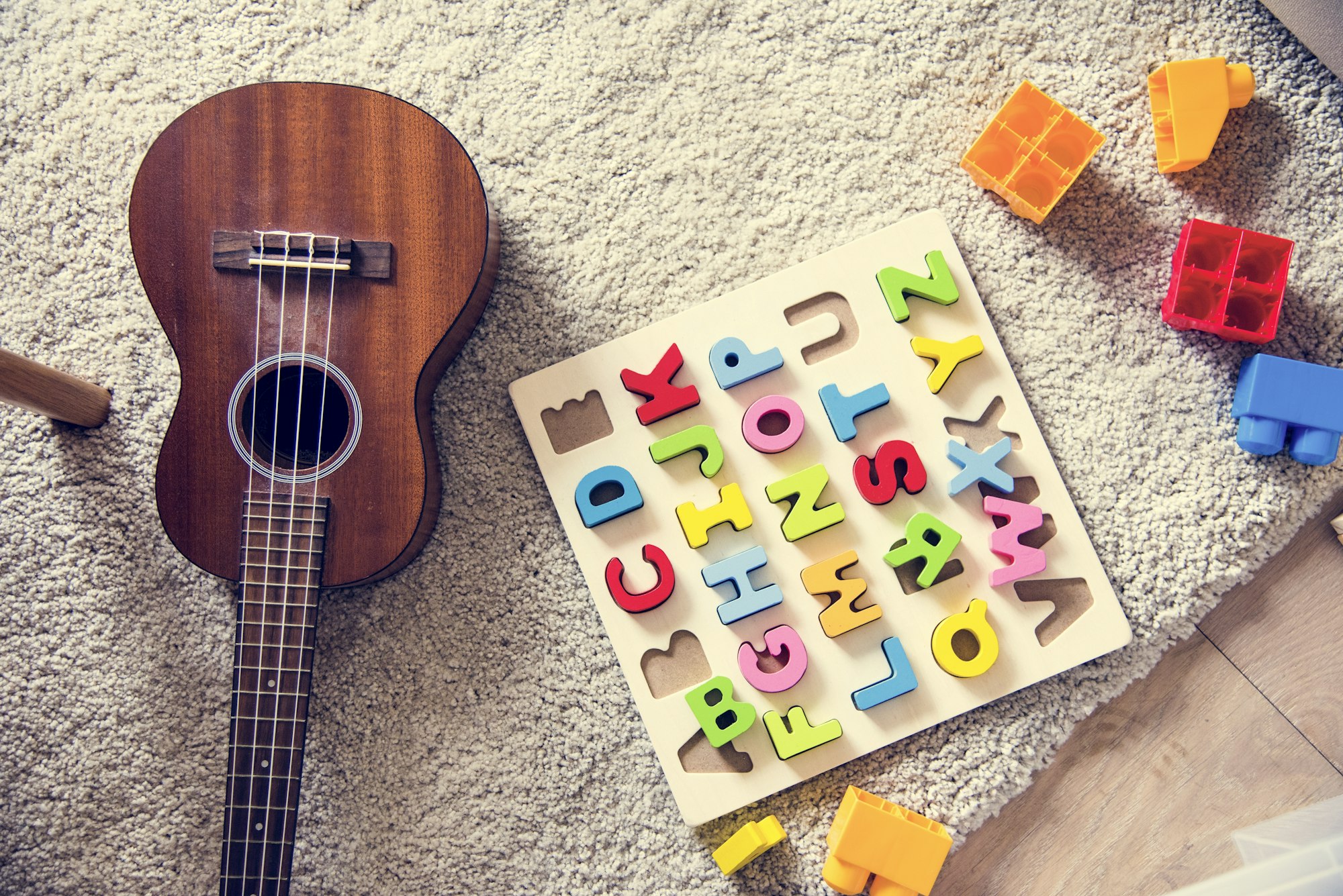 Guitar and educational toys in living room